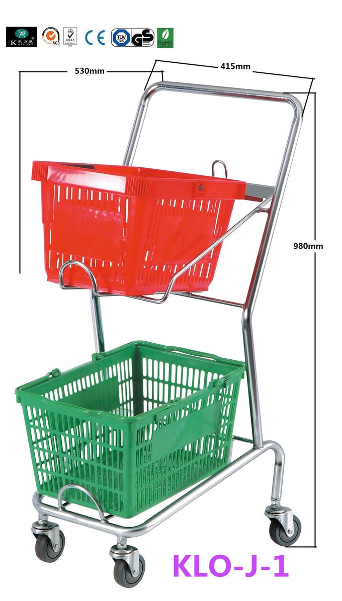 Paniers à provisions rouges/tenus dans la main de panier à provisions en plastique au détail de supermarché