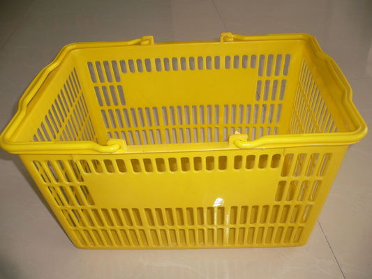 Chine Le panier à provisions en plastique jaune tenu dans la main/simples portatifs portent des paniers de poignée usine